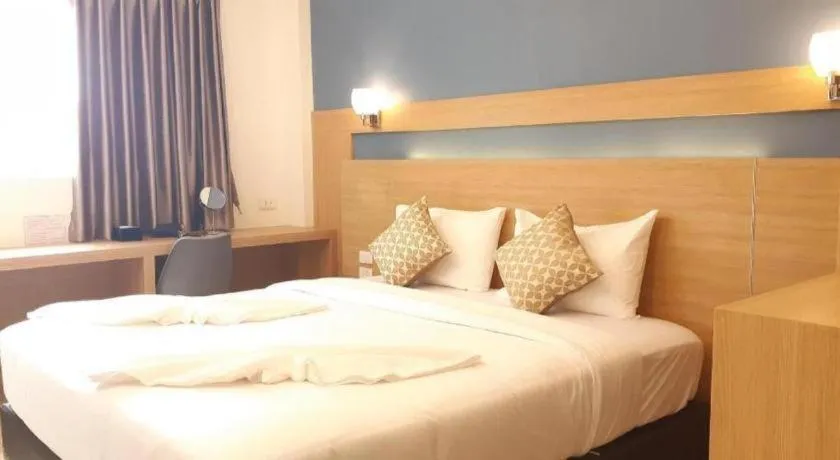 Bed in Ceniq Hotel