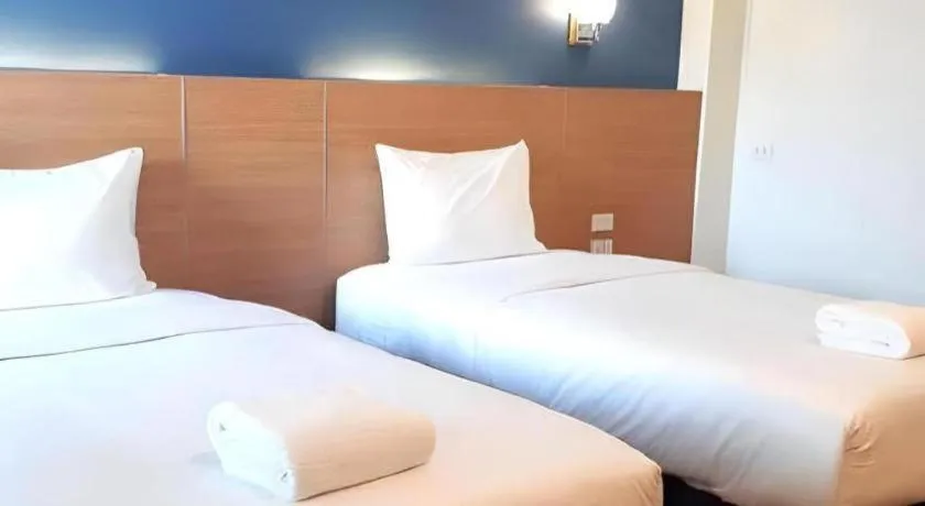 Bed in Ceniq Hotel