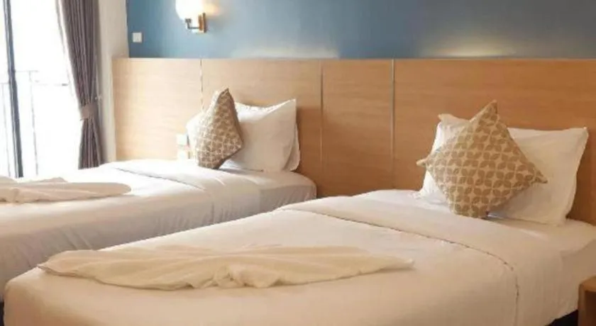 Bed in Ceniq Hotel
