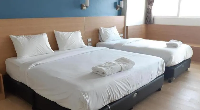 Bed in Ceniq Hotel
