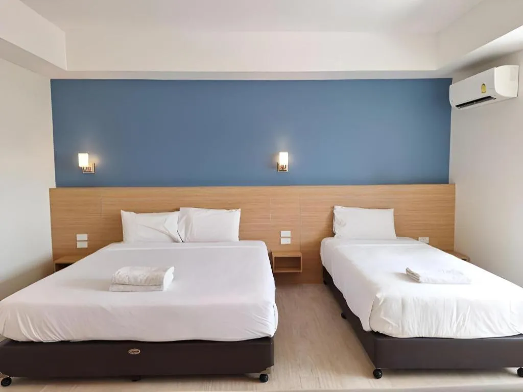 Bed in Ceniq Hotel