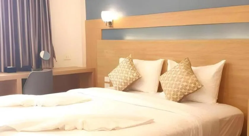 Bed in Ceniq Hotel