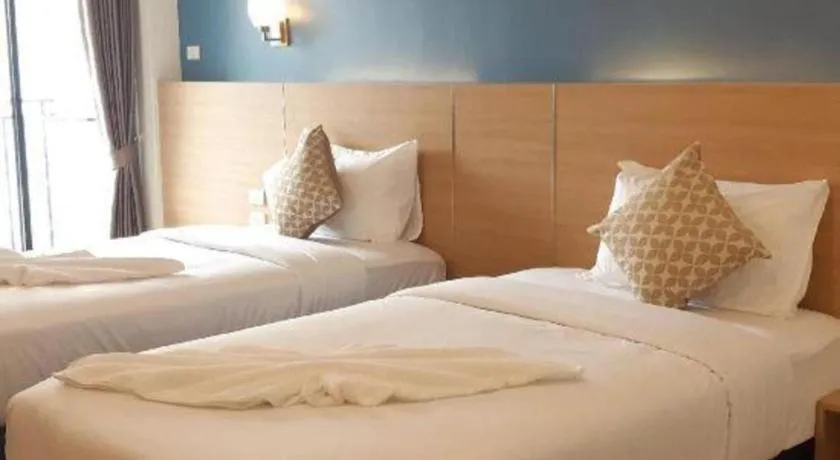 Bed in Ceniq Hotel