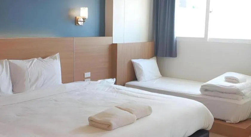 Bed in Ceniq Hotel
