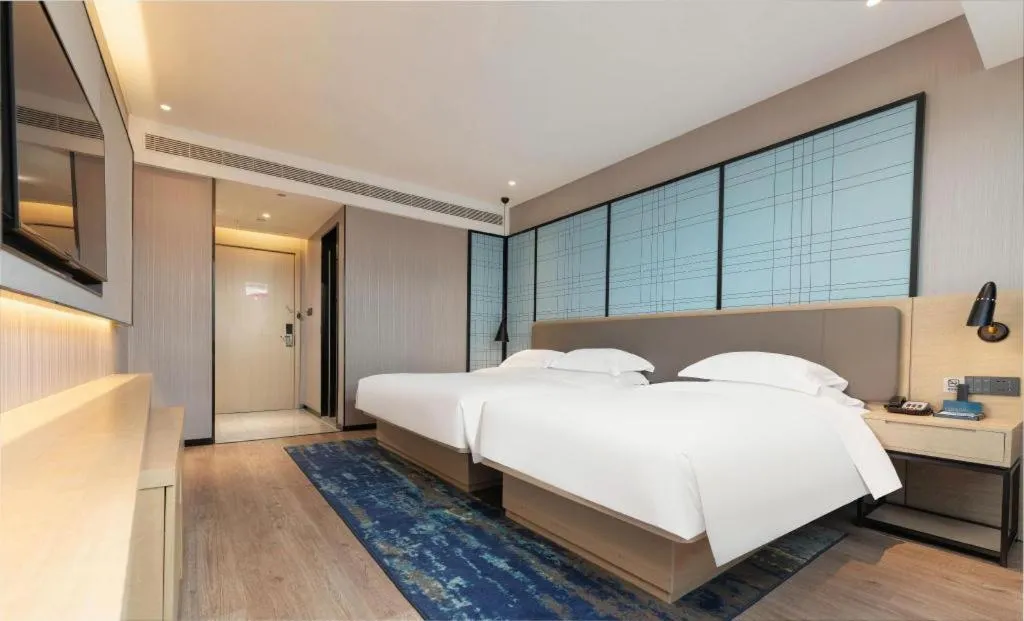 Bed in Echarm Hotel Hanzhong Wetland Park