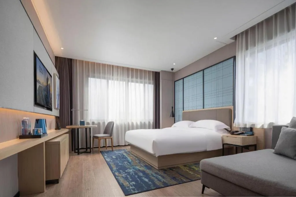 Bed in Echarm Hotel Hanzhong Wetland Park