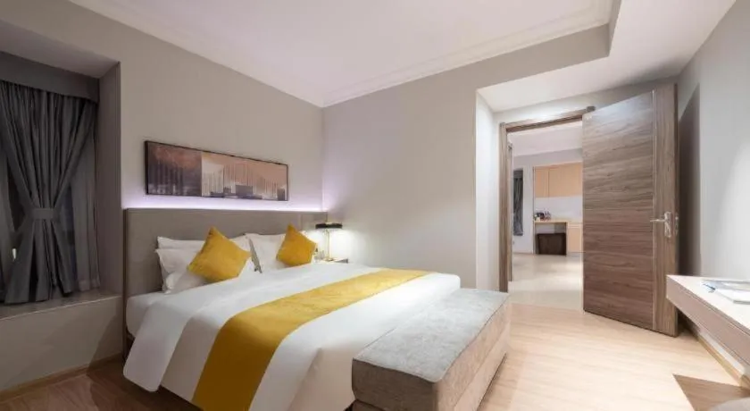 Bed in Poltton International Service Apartment Shanwei Urban District High-speed Railway Station