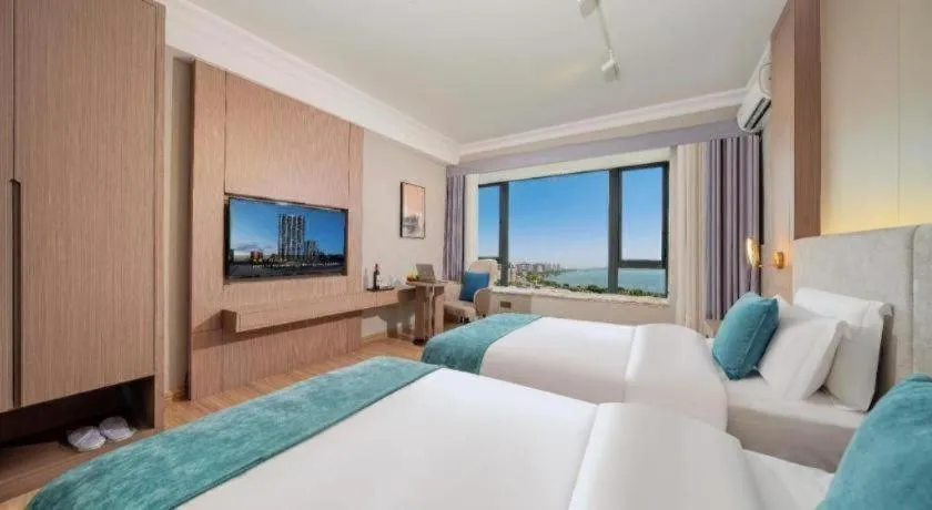 Bed in Poltton International Service Apartment Shanwei Urban District High-speed Railway Station