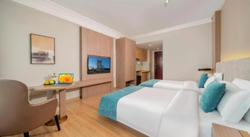 Bed in Poltton International Service Apartment Shanwei Urban District High-speed Railway Station