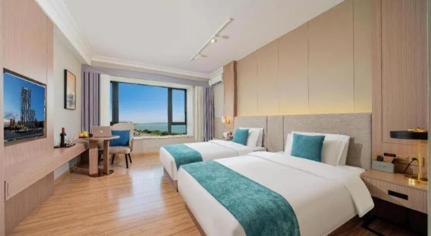 Bed in Poltton International Service Apartment Shanwei Urban District High-speed Railway Station