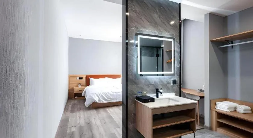 Bed in Borrman Hotel Jiangyin Zhouzhuang