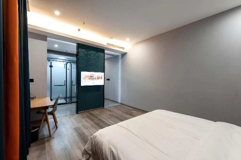 Bed in Borrman Hotel Jiangyin Zhouzhuang