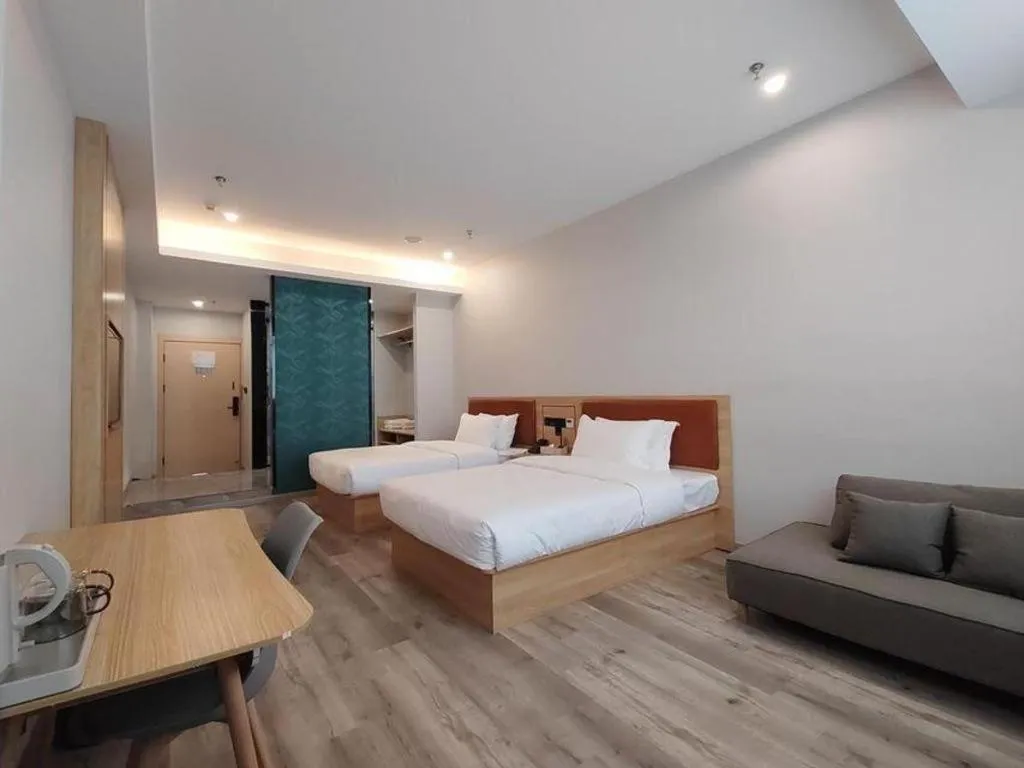 Bed in Borrman Hotel Jiangyin Zhouzhuang