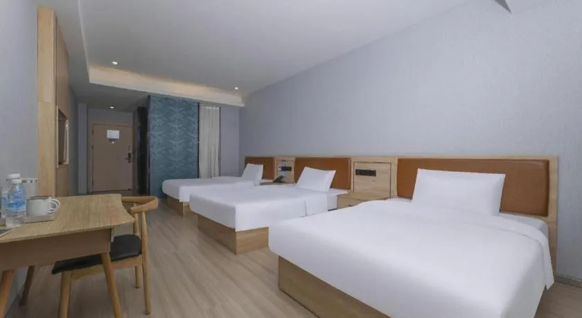 Bed in Borrman Hotel Jiangyin Zhouzhuang