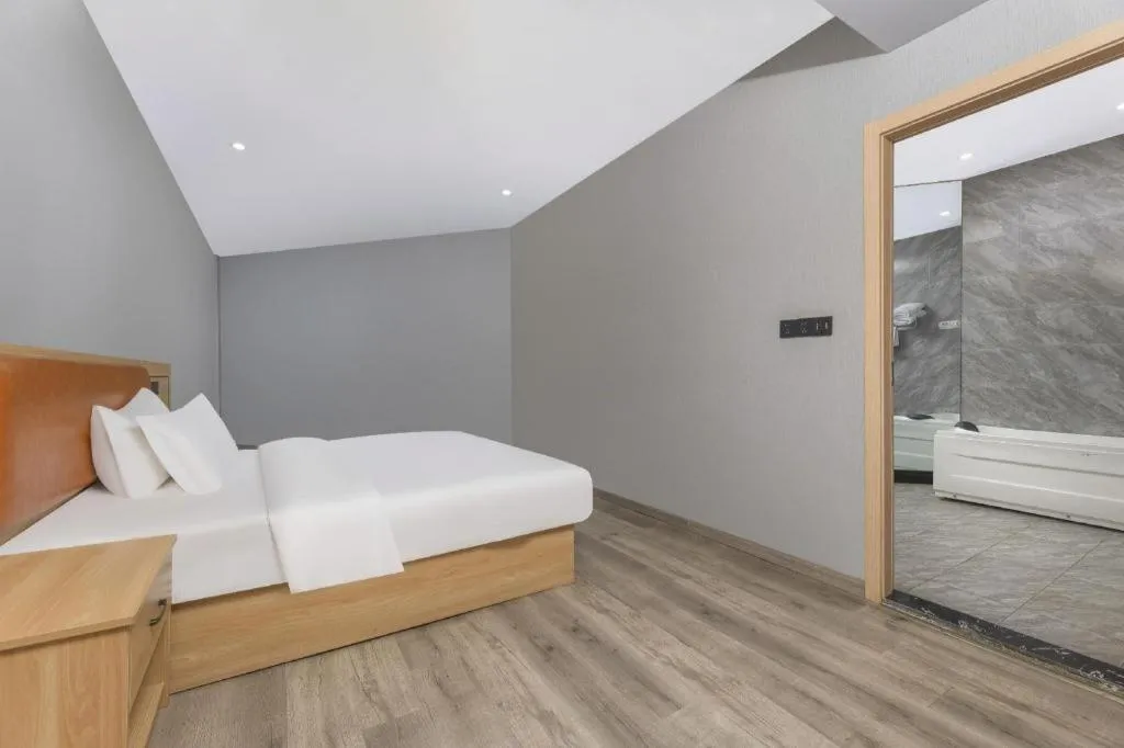 Bed in Borrman Hotel Jiangyin Zhouzhuang