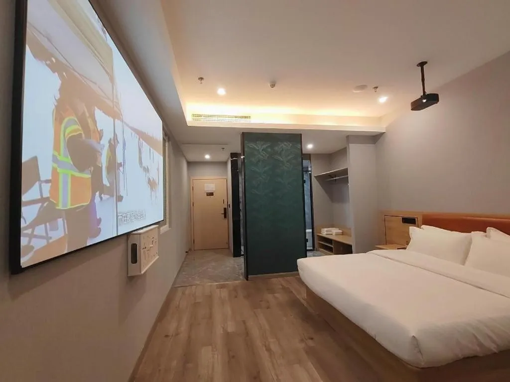 Bed in Borrman Hotel Jiangyin Zhouzhuang