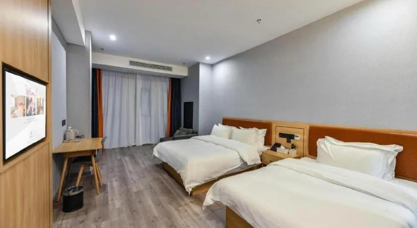 Bed in Borrman Hotel Jiangyin Zhouzhuang