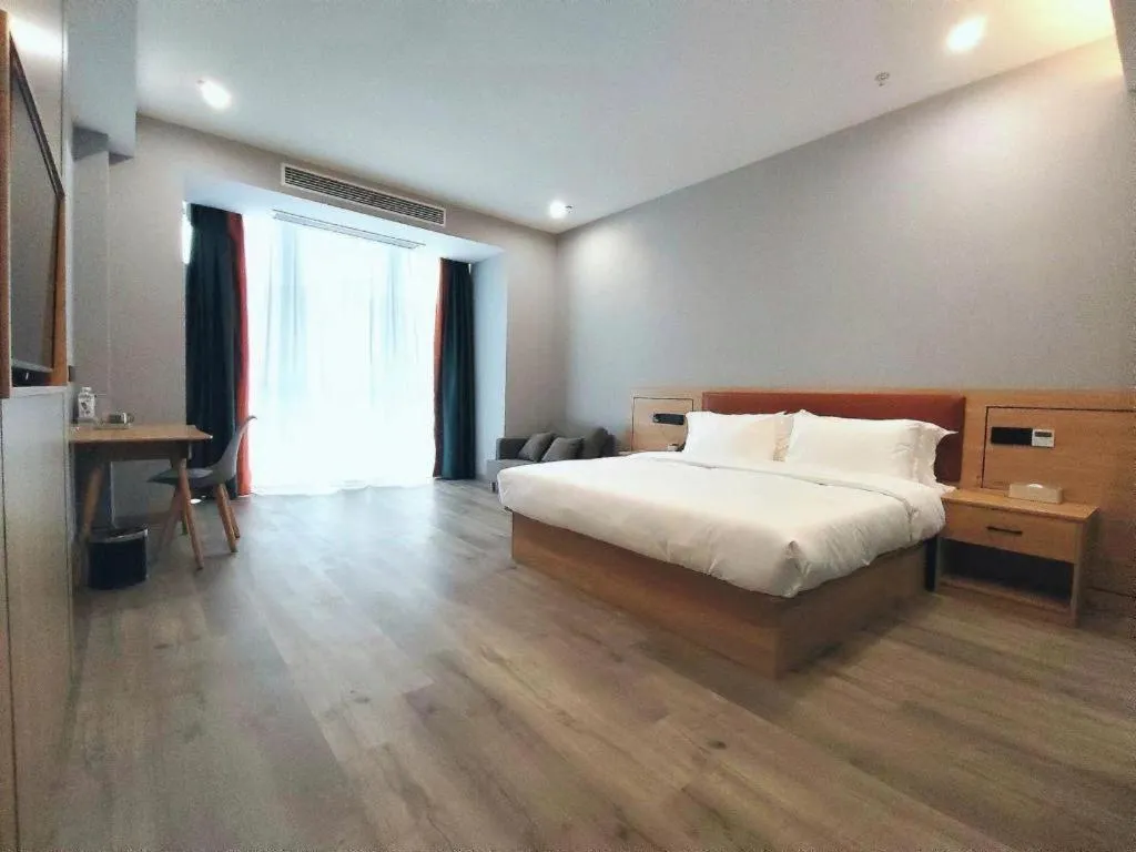 Bed in Borrman Hotel Jiangyin Zhouzhuang