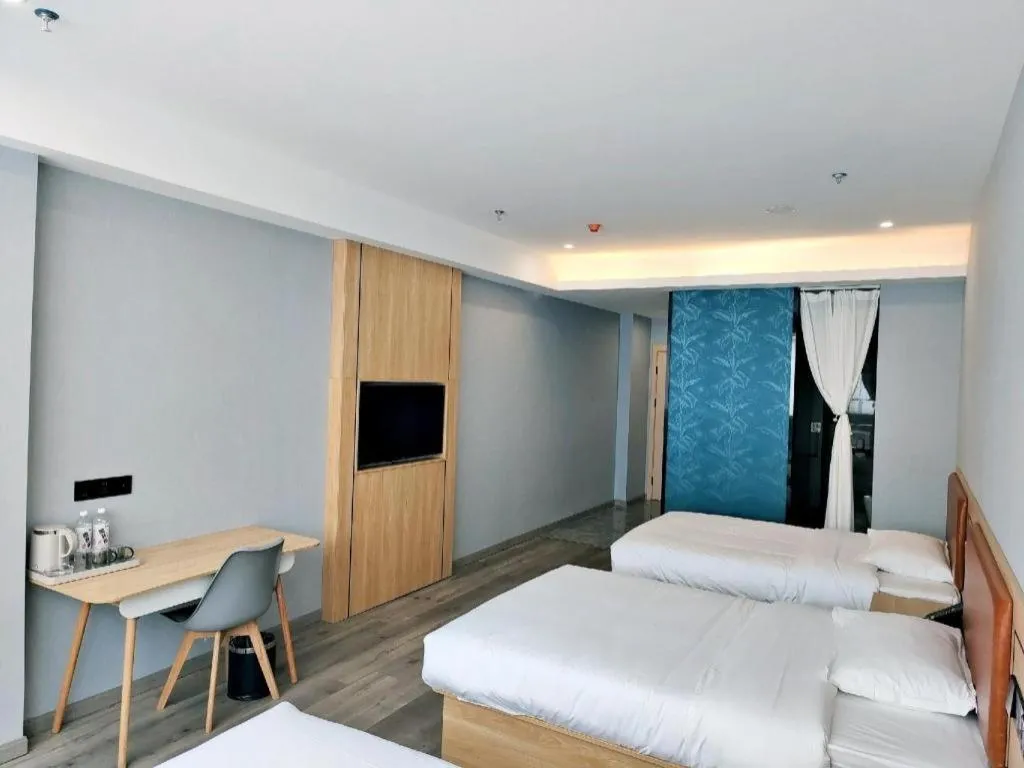 Bed in Borrman Hotel Jiangyin Zhouzhuang