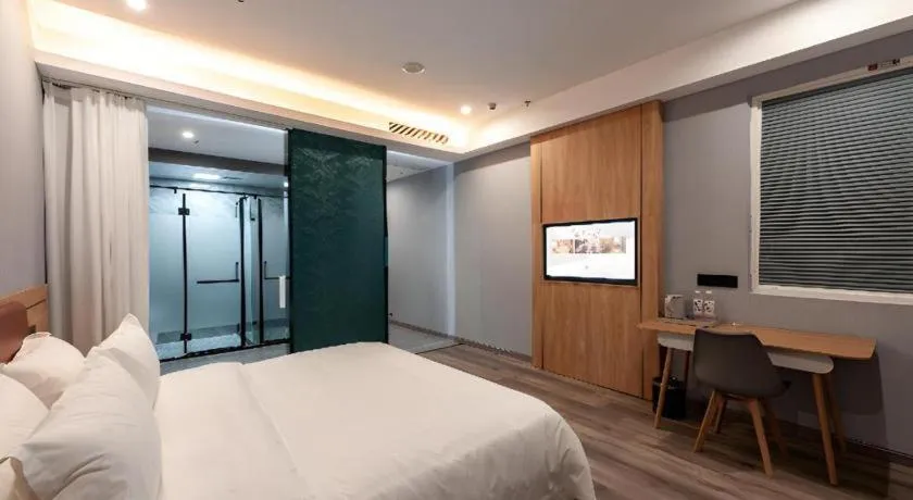 Bed in Borrman Hotel Jiangyin Zhouzhuang