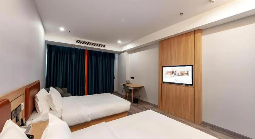 Bed in Borrman Hotel Jiangyin Zhouzhuang