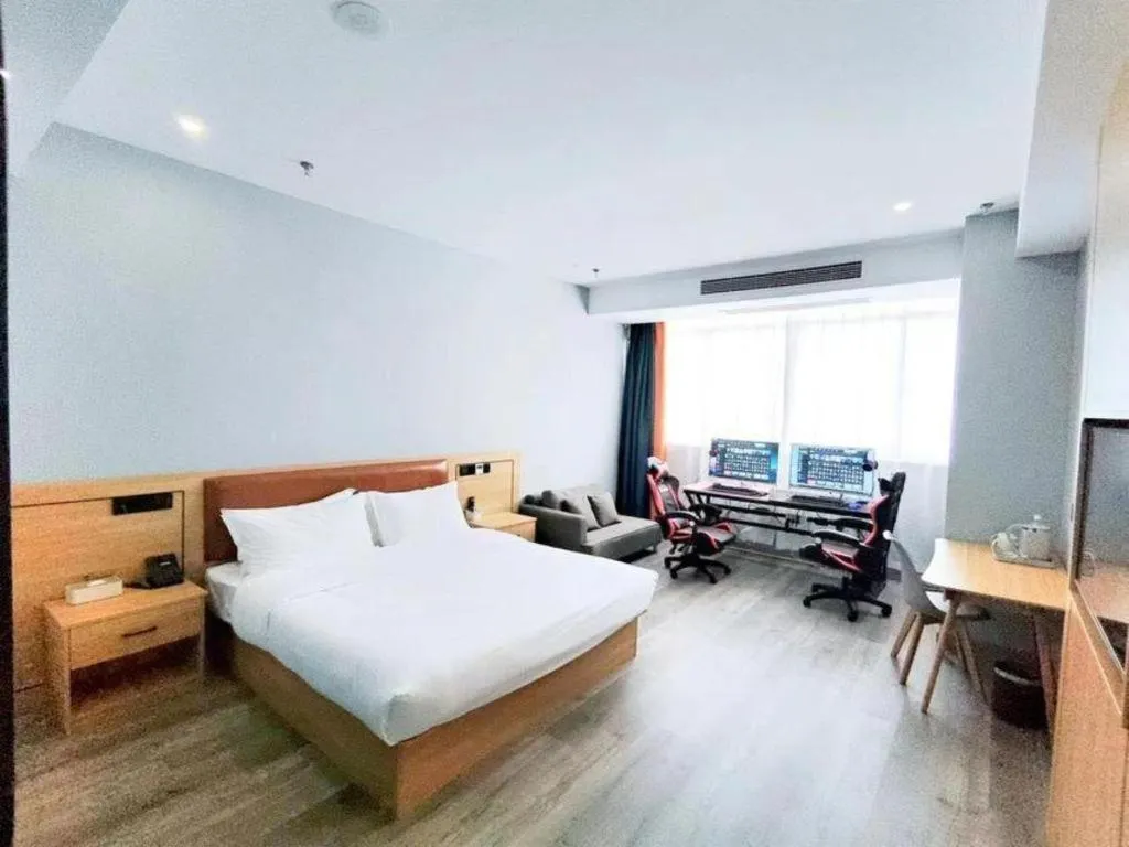 Bed in Borrman Hotel Jiangyin Zhouzhuang