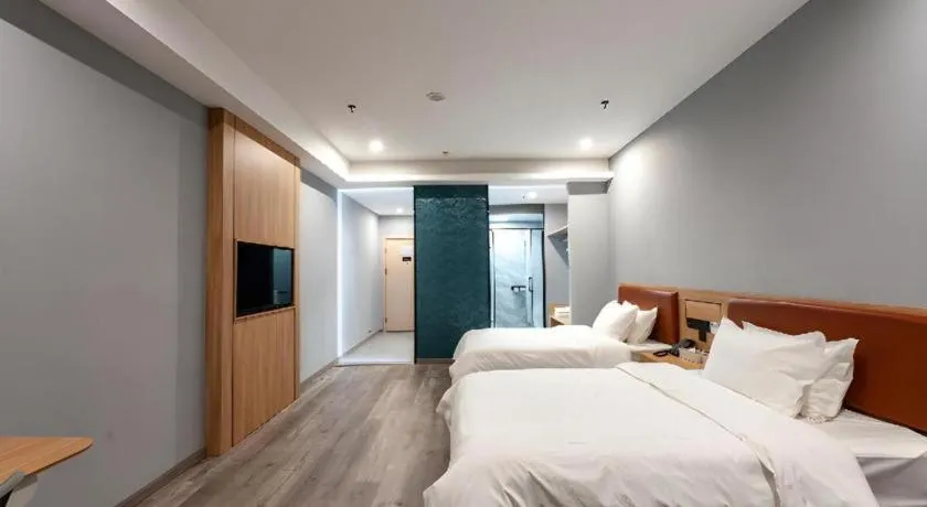 Bed in Borrman Hotel Jiangyin Zhouzhuang