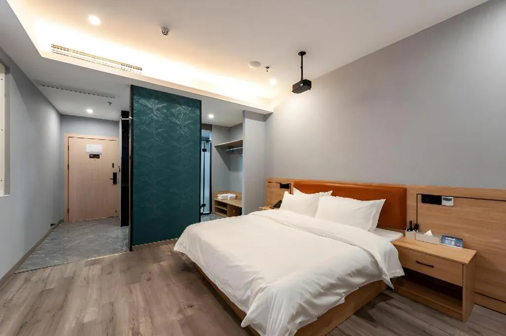 Bed in Borrman Hotel Jiangyin Zhouzhuang