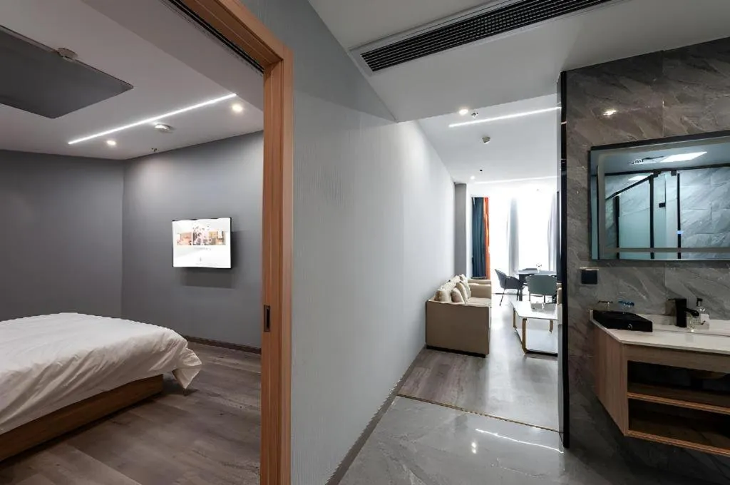 Bed in Borrman Hotel Jiangyin Zhouzhuang