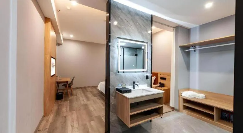 Bed in Borrman Hotel Jiangyin Zhouzhuang