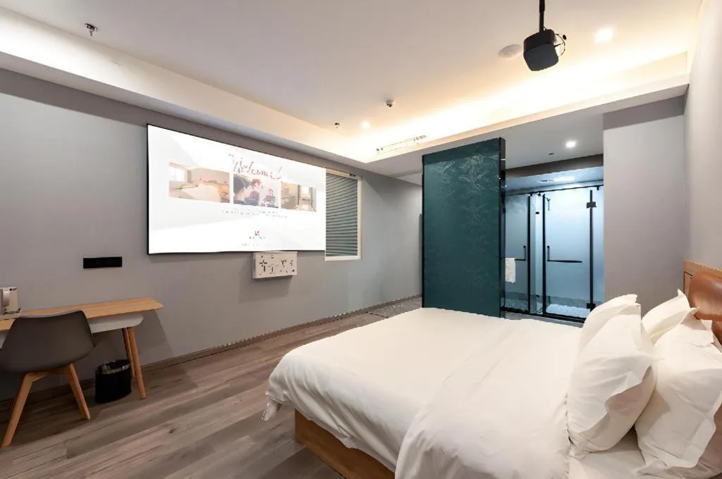 Bed in Borrman Hotel Jiangyin Zhouzhuang