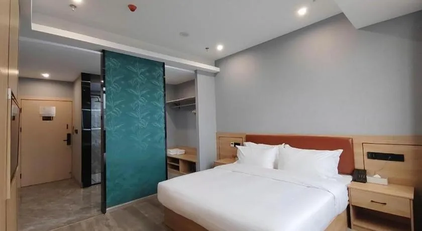 Bed in Borrman Hotel Jiangyin Zhouzhuang