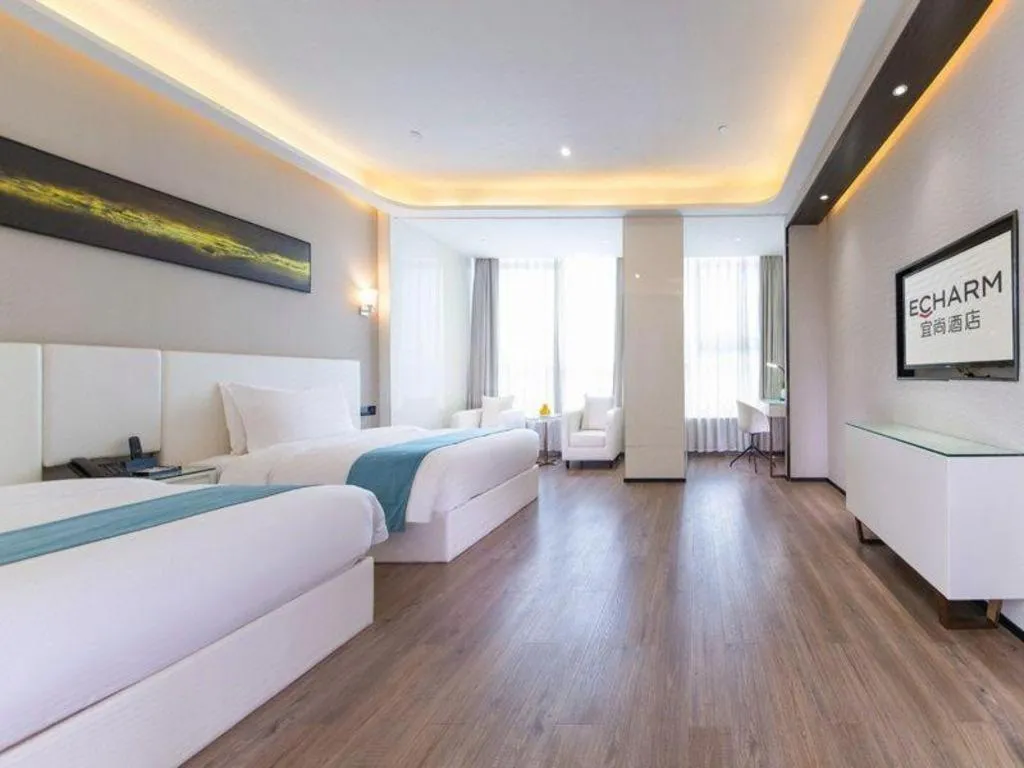 Bed in Echarm Hotel Wuhan Wusheng Road Metro Station Cade Square