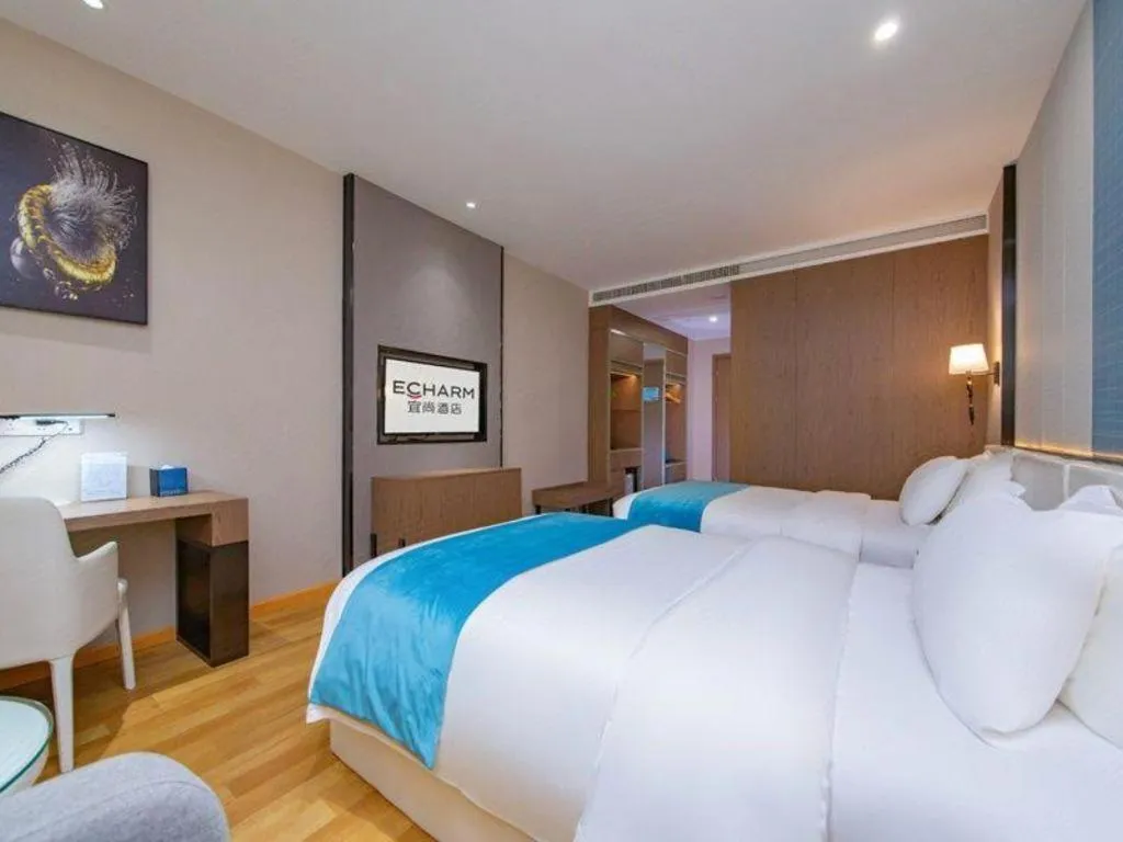 Bed in Echarm Hotel Wuhan Wusheng Road Metro Station Cade Square