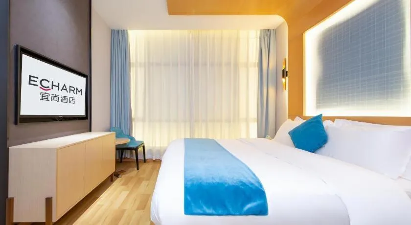 Bed in Echarm Hotel Wuhan Wusheng Road Metro Station Cade Square