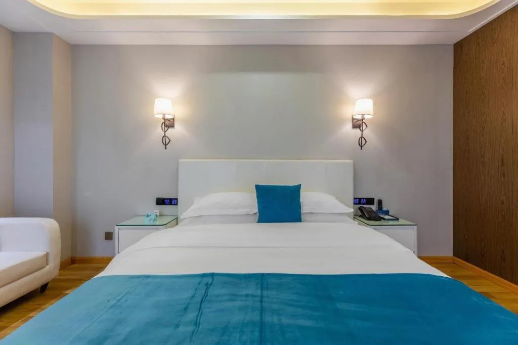 Bed in Echarm Hotel Wuhan Wusheng Road Metro Station Cade Square