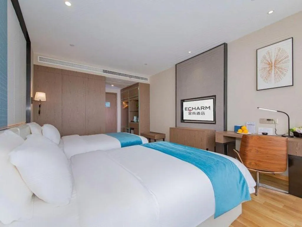 Bed in Echarm Hotel Wuhan Wusheng Road Metro Station Cade Square