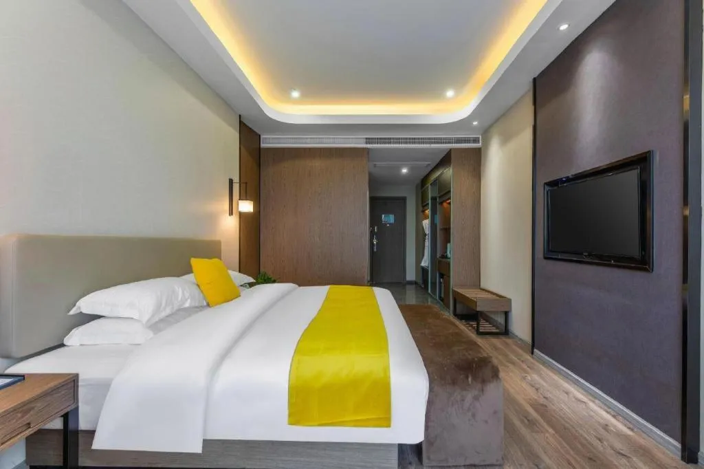 Bed in Echarm Hotel Wuhan Wusheng Road Metro Station Cade Square
