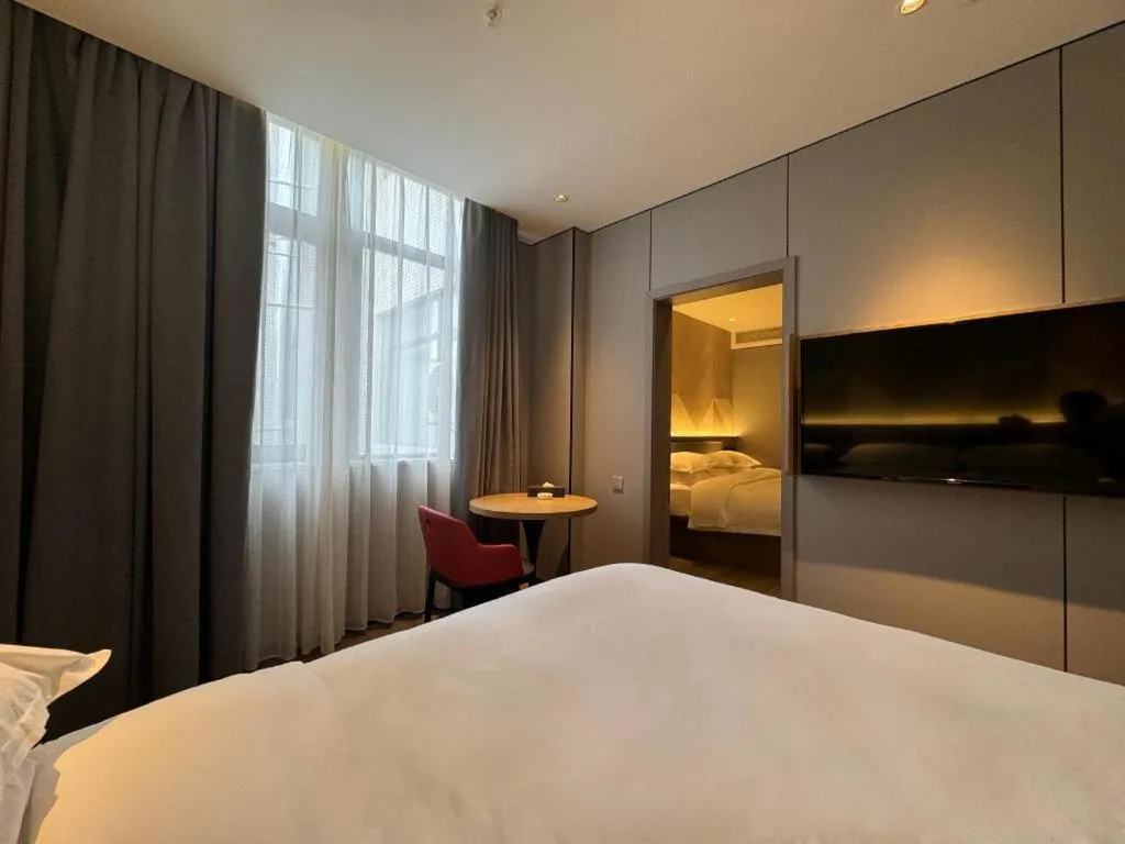 Bed in Borrman Hotel Lianjiang Avenue Xinyuan International Plaza