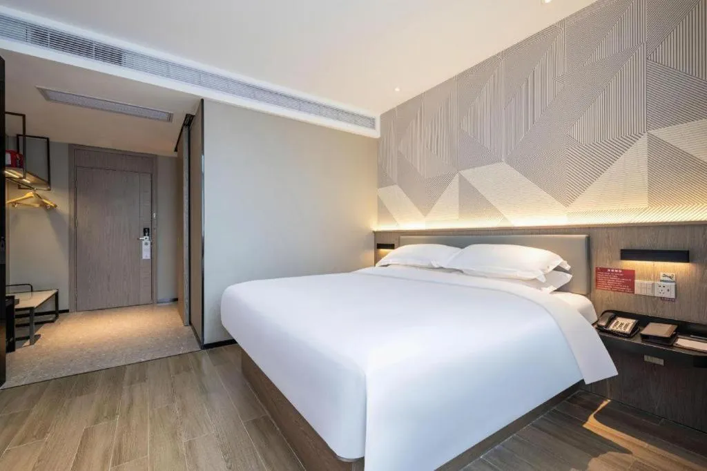 Bed in Borrman Hotel Lianjiang Avenue Xinyuan International Plaza