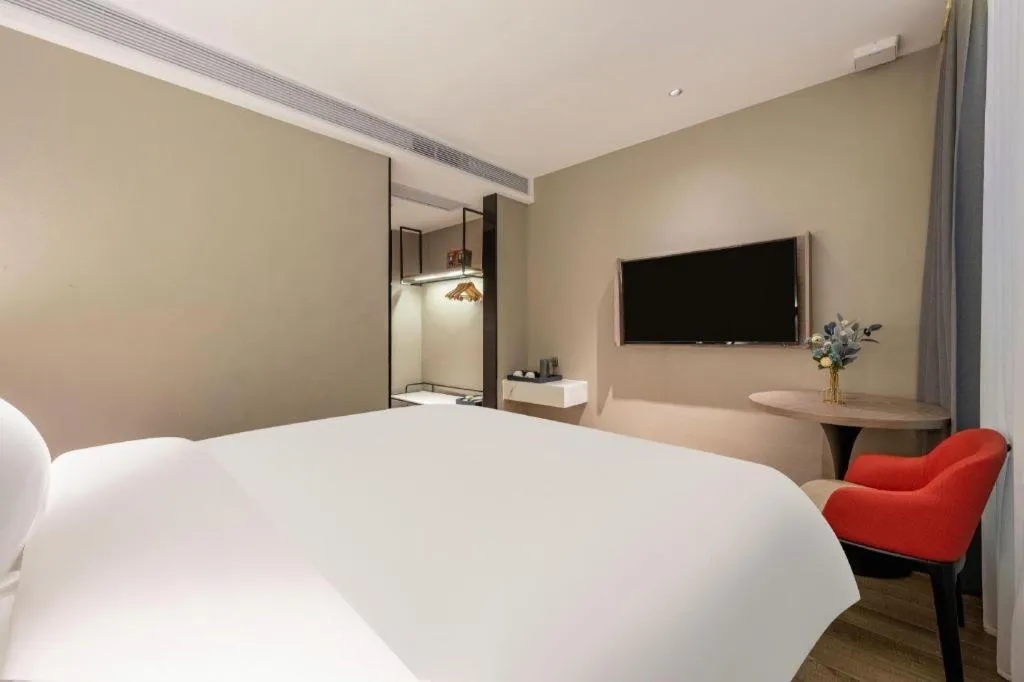 Bed in Borrman Hotel Lianjiang Avenue Xinyuan International Plaza