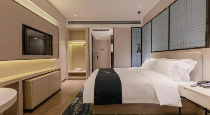 Bed in Echarm Hotel Yantai Wuzhou International
