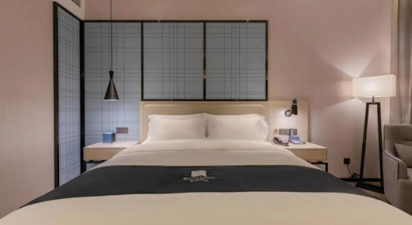 Bed in Echarm Hotel Yantai Wuzhou International