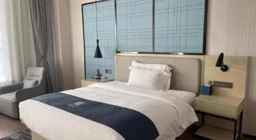 Bed in Echarm Hotel Yantai Wuzhou International