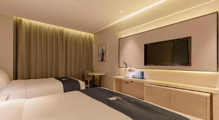 Bed in Echarm Hotel Yantai Wuzhou International