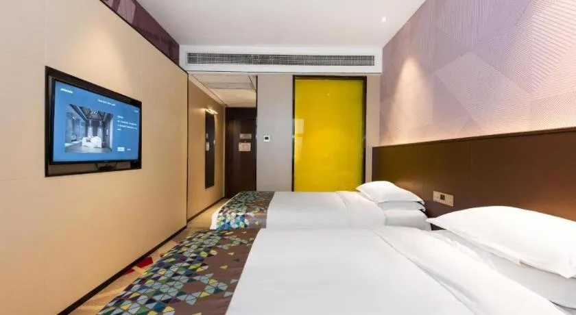 Bed in Borrman Hotel Wuhan Hankou Railway Station Metro Station
