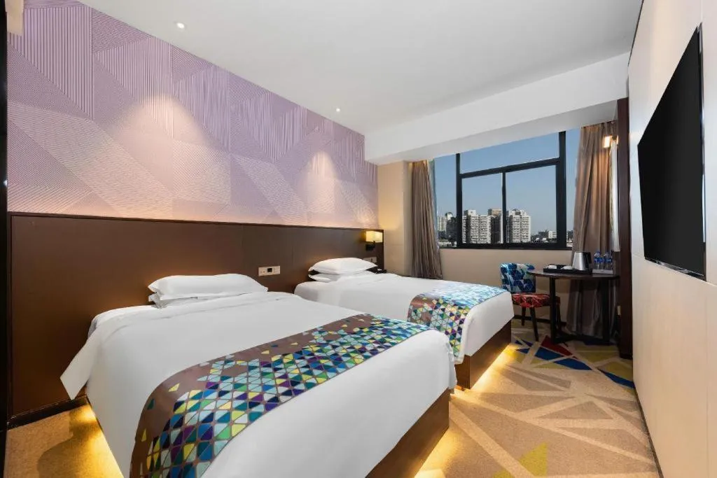 Bed in Borrman Hotel Wuhan Hankou Railway Station Metro Station