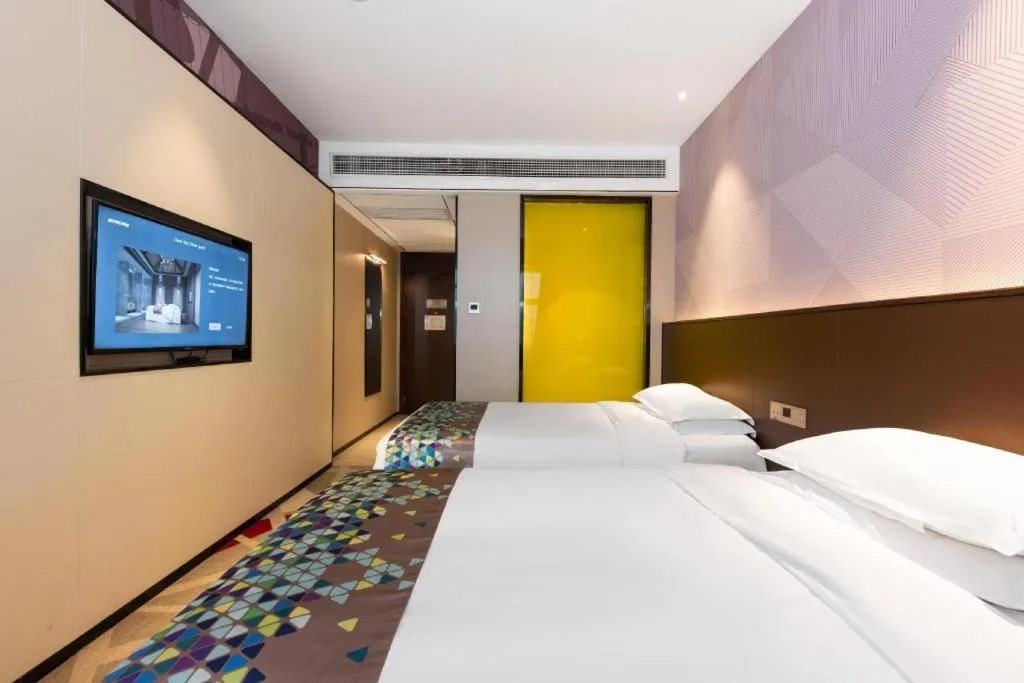 Bed in Borrman Hotel Wuhan Hankou Railway Station Metro Station