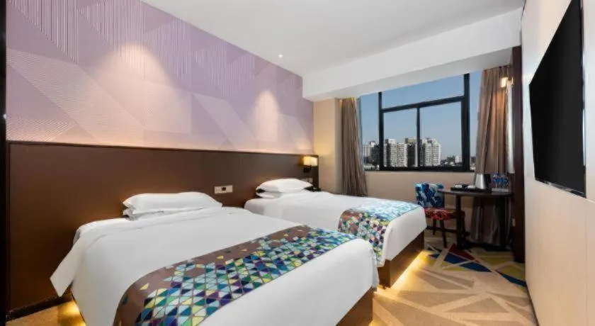 Bed in Borrman Hotel Wuhan Hankou Railway Station Metro Station