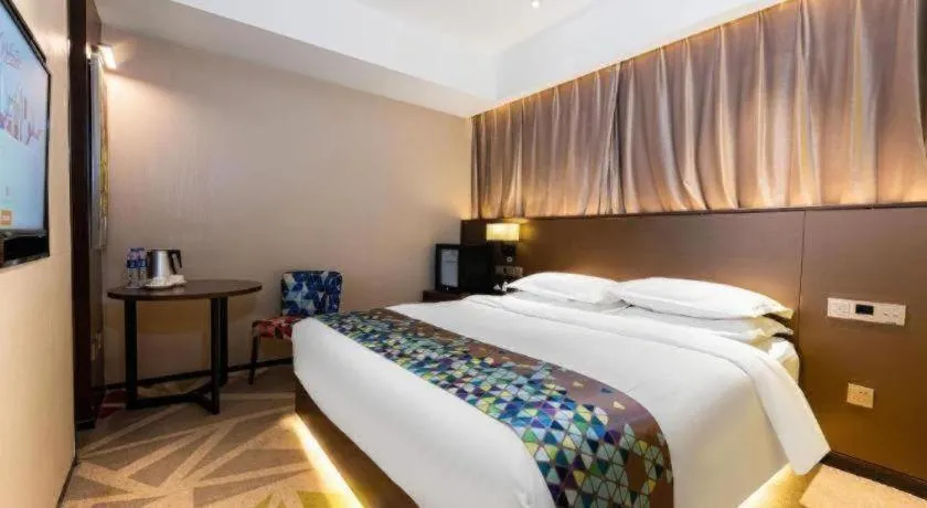 Bed in Borrman Hotel Wuhan Hankou Railway Station Metro Station